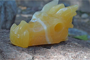 Crystal Wholesale Pale Orange Calcite (with White Inclusions) Crystal Dragon Skull Carving - Medium