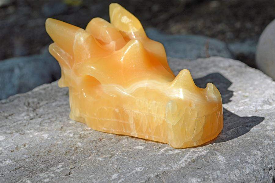 Crystal Wholesale Pale Orange Calcite (with White Inclusions) Crystal Dragon Skull Carving - Medium